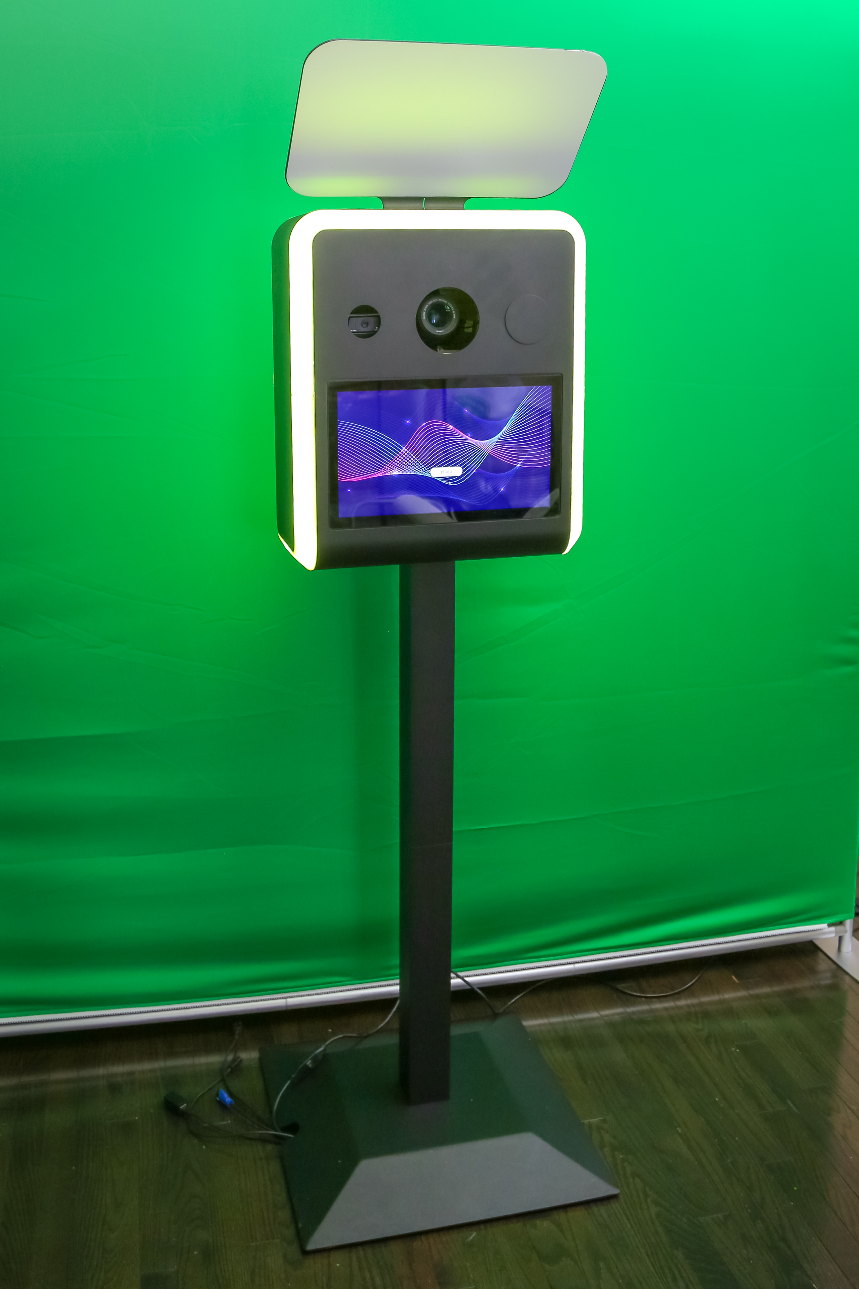 Premium DSLR photo booth rental with professional camera, studio lighting and touchscreen display by The Photo Booth Company of Toronto.