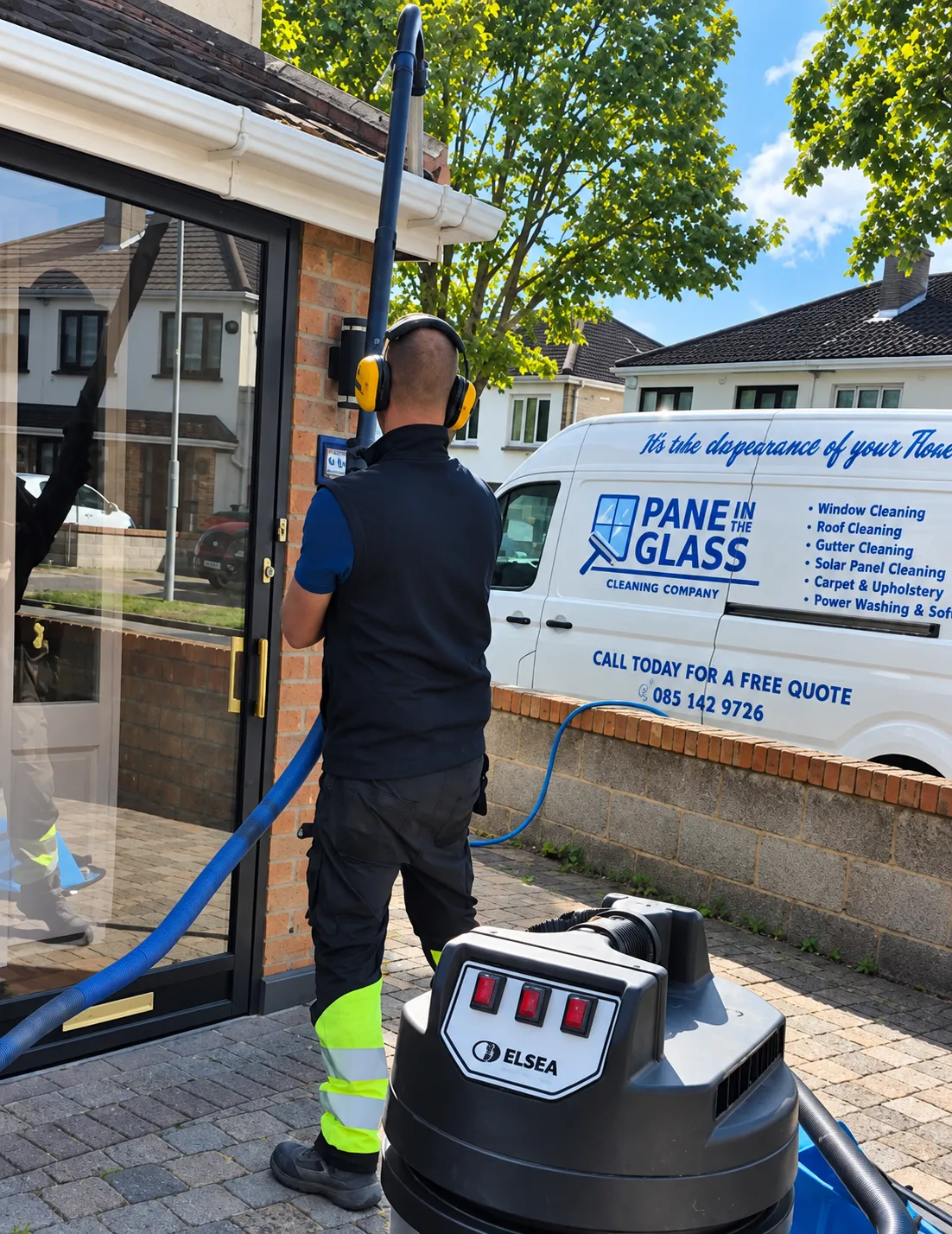 Pane In The Glass professional exterior cleaning crew with water-fed pole equipment on site in Dublin