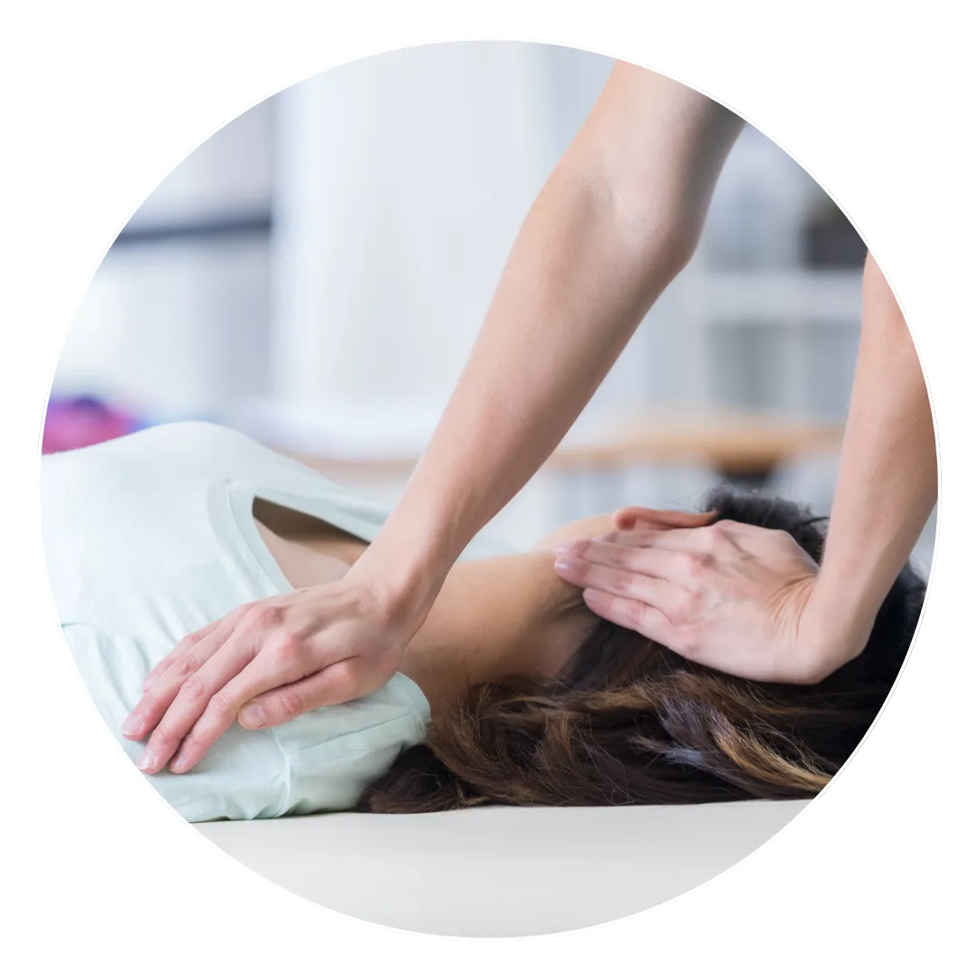 Injury chiropractor providing a free assessment to evaluate pain and mobility issues.