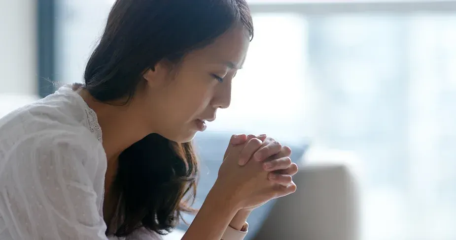 Woman in Prayer