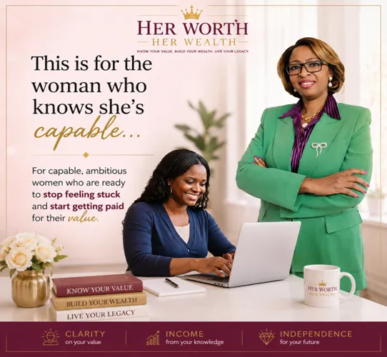 Stella Mofor standing beside a woman using a laptop