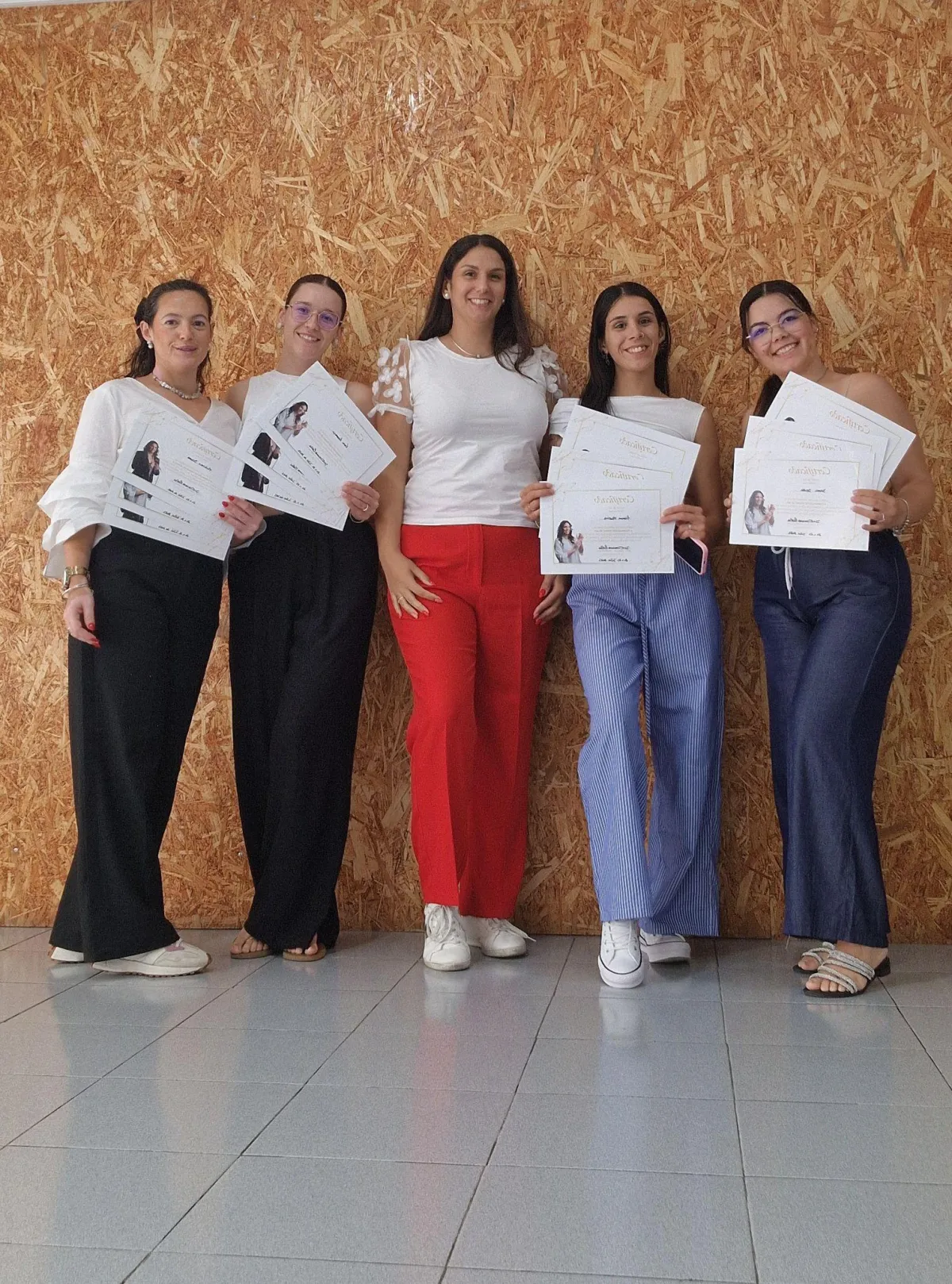 woman holding her black sunglasses