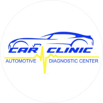 Mechanic performing oil change in clean workshop on modern car