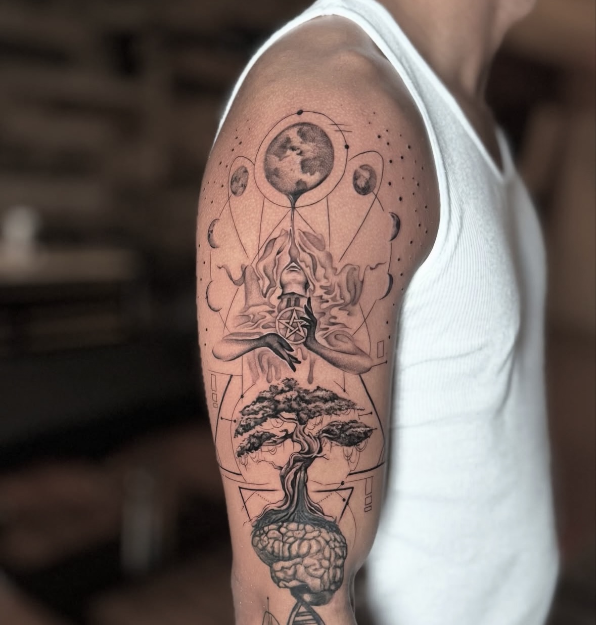 person with black rose tattoo