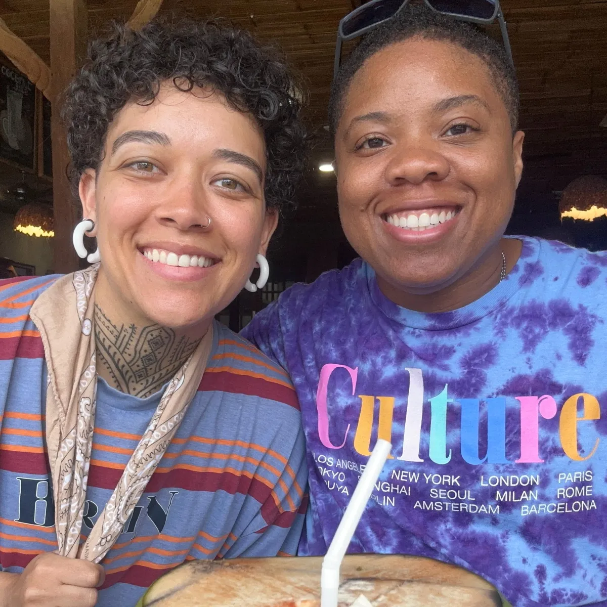 Destinē and Victoria of Energy of Creation smiling and holding space together.