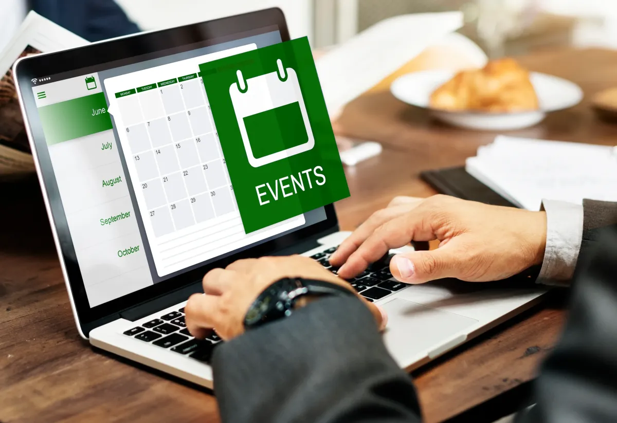 man holding incandescent bulb