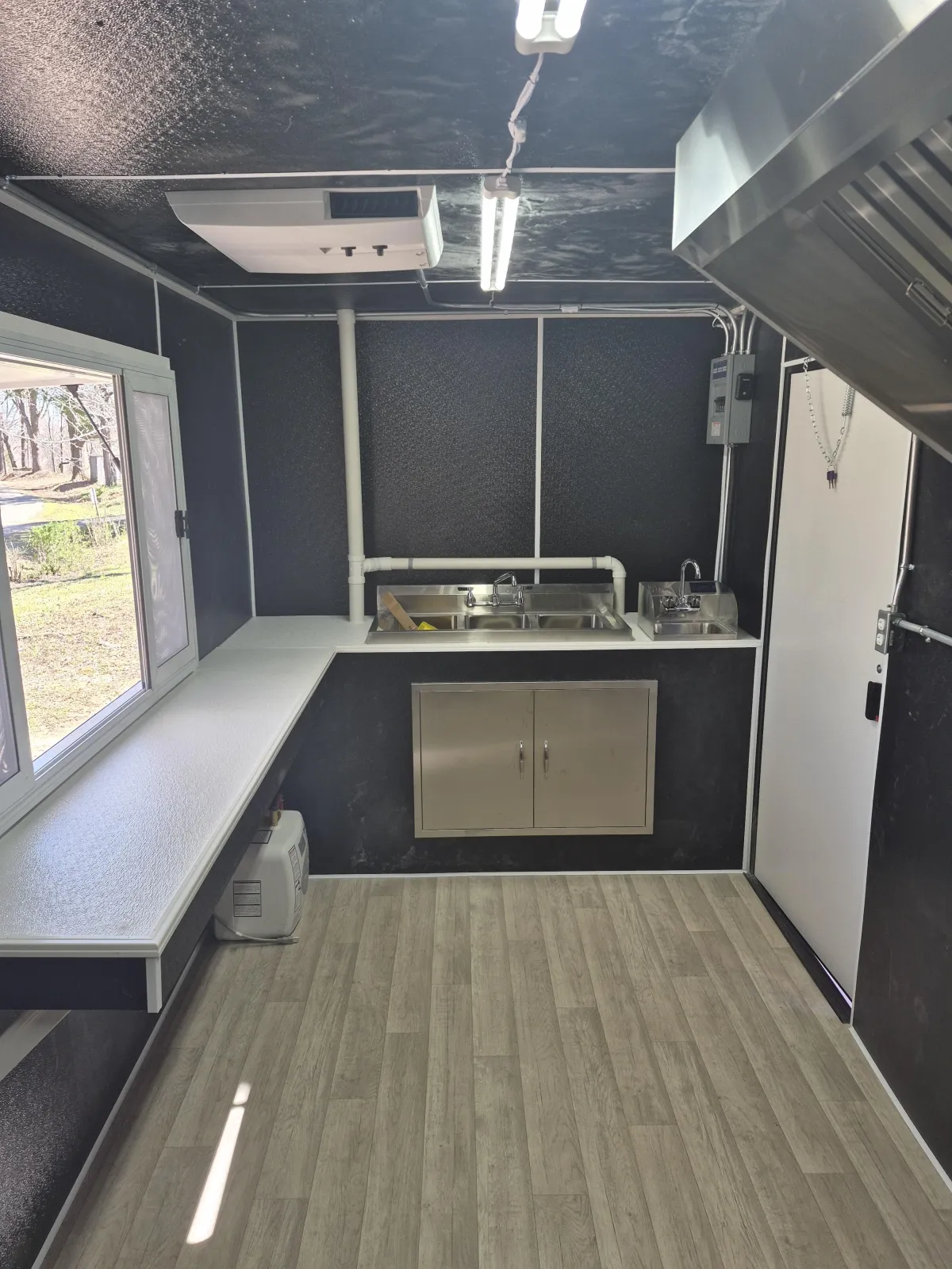 white wooden cabinet beside brown wooden desk