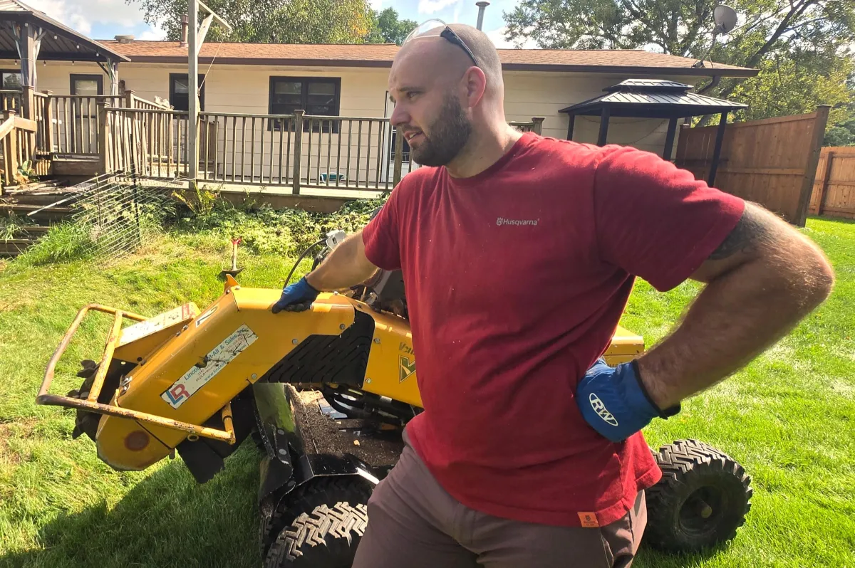 Stump grinding in a residential yard