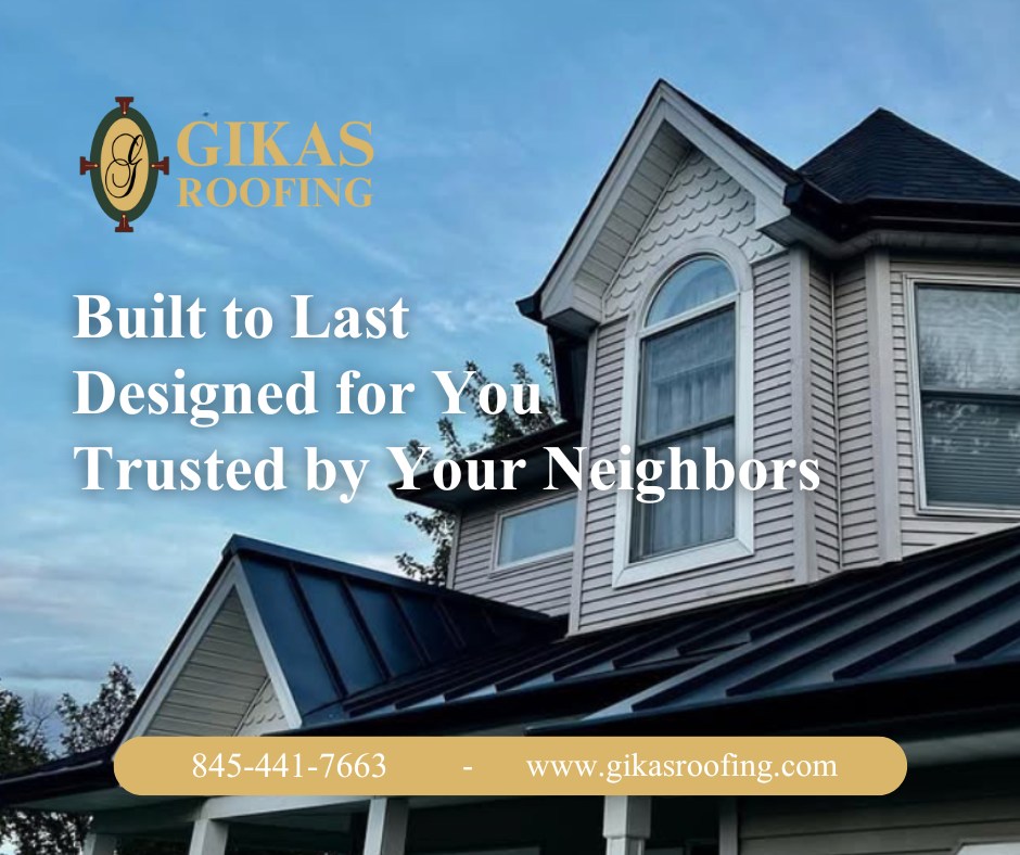 The roof of a building with a tree in the background