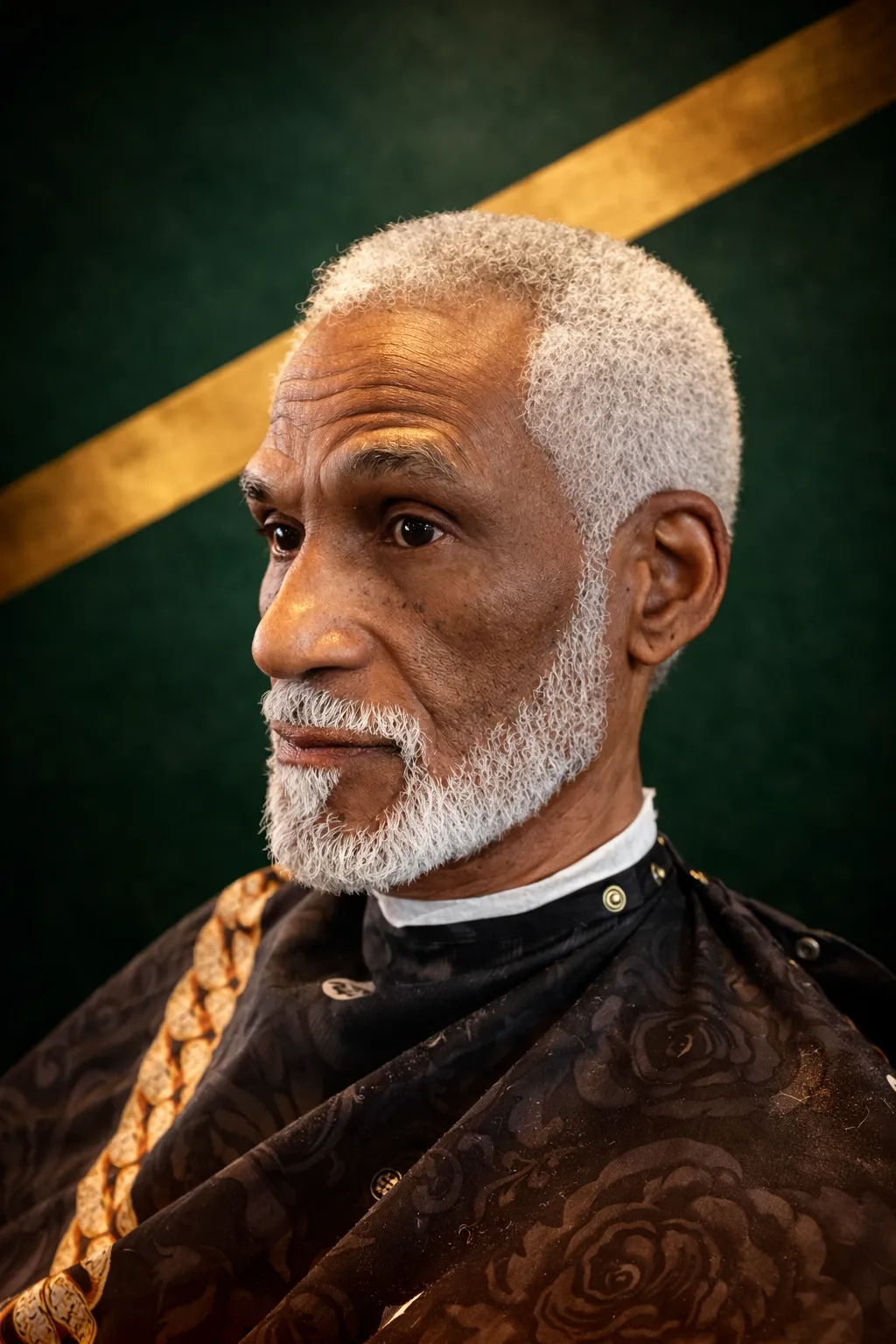 Barber sculpting an angular beard line with straight razor and trimmer