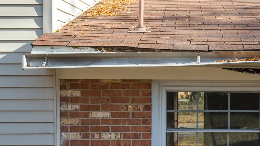 Gutters sagging and detached from a home in Albany Ga