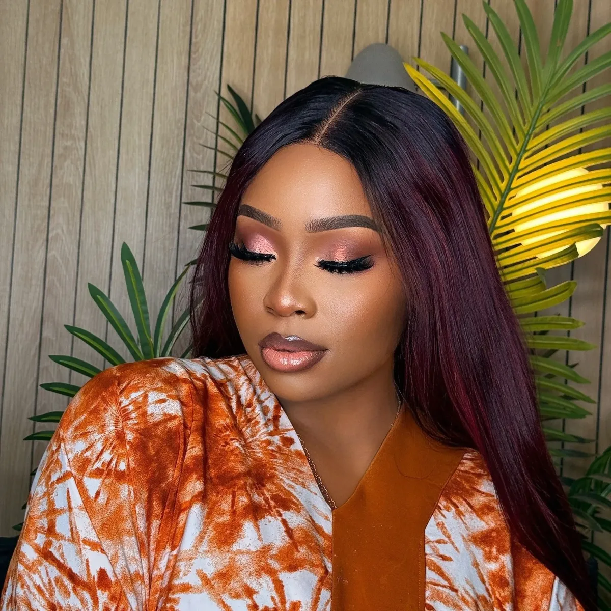 Glueless frontal wig installation by JB's Dazzle featuring natural blending and secure application.