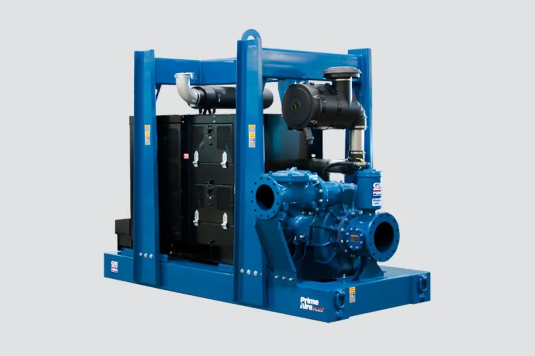 A woman riding a bike down a street next to tall buildings