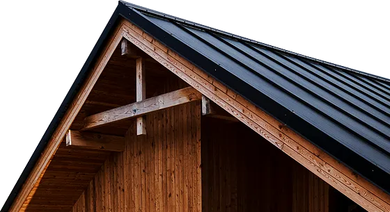 Modern wooden house with a metal roof under a dramatic evening sky, representing roofing excellence by  in ."  Let me know if you need further adjustments!
