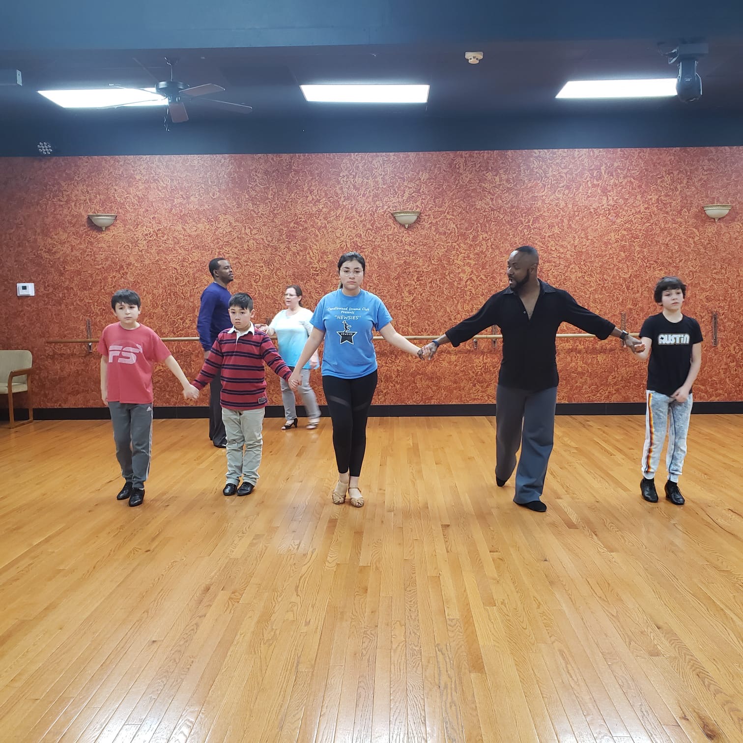 Kids ballroom dance class smiling