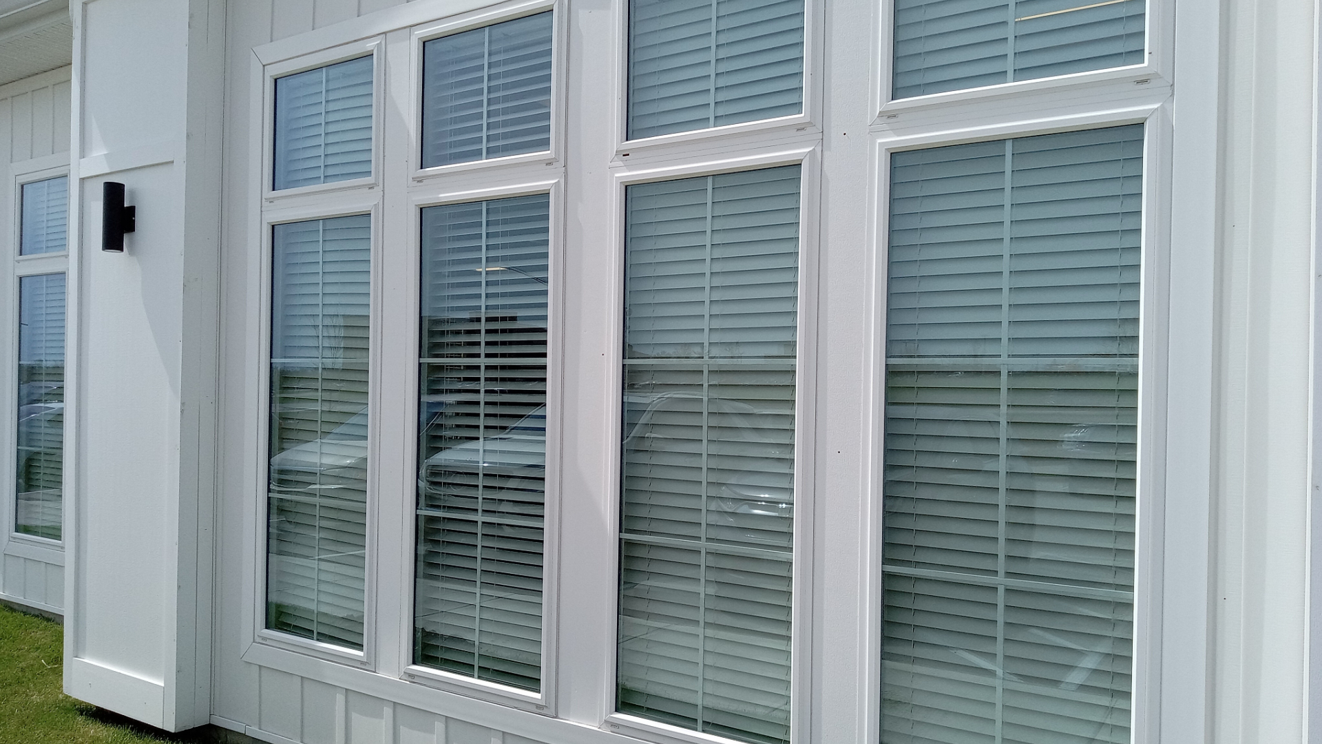 Newly installed windows by Reese Roofing for Florida home.