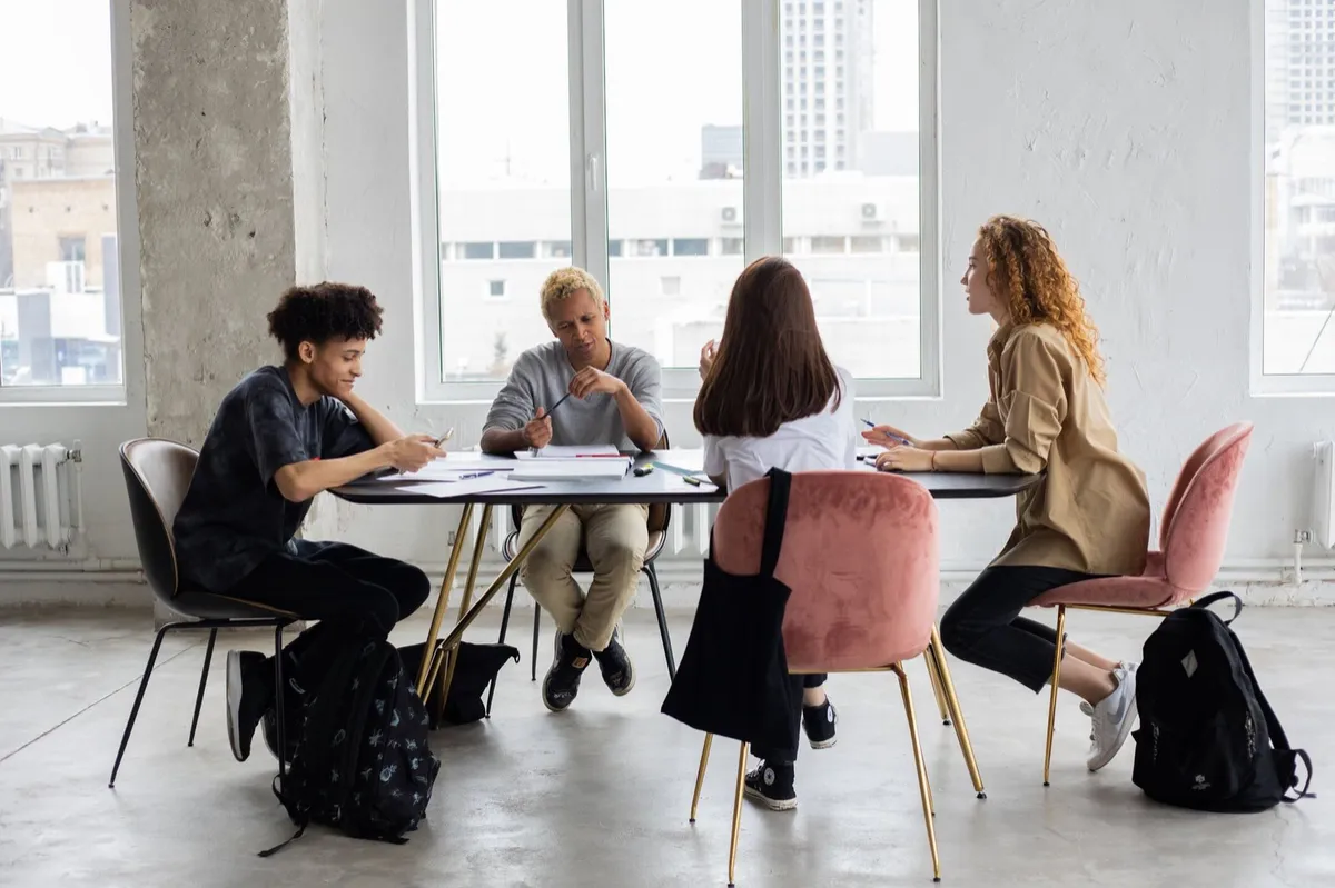 Teens working together around a table