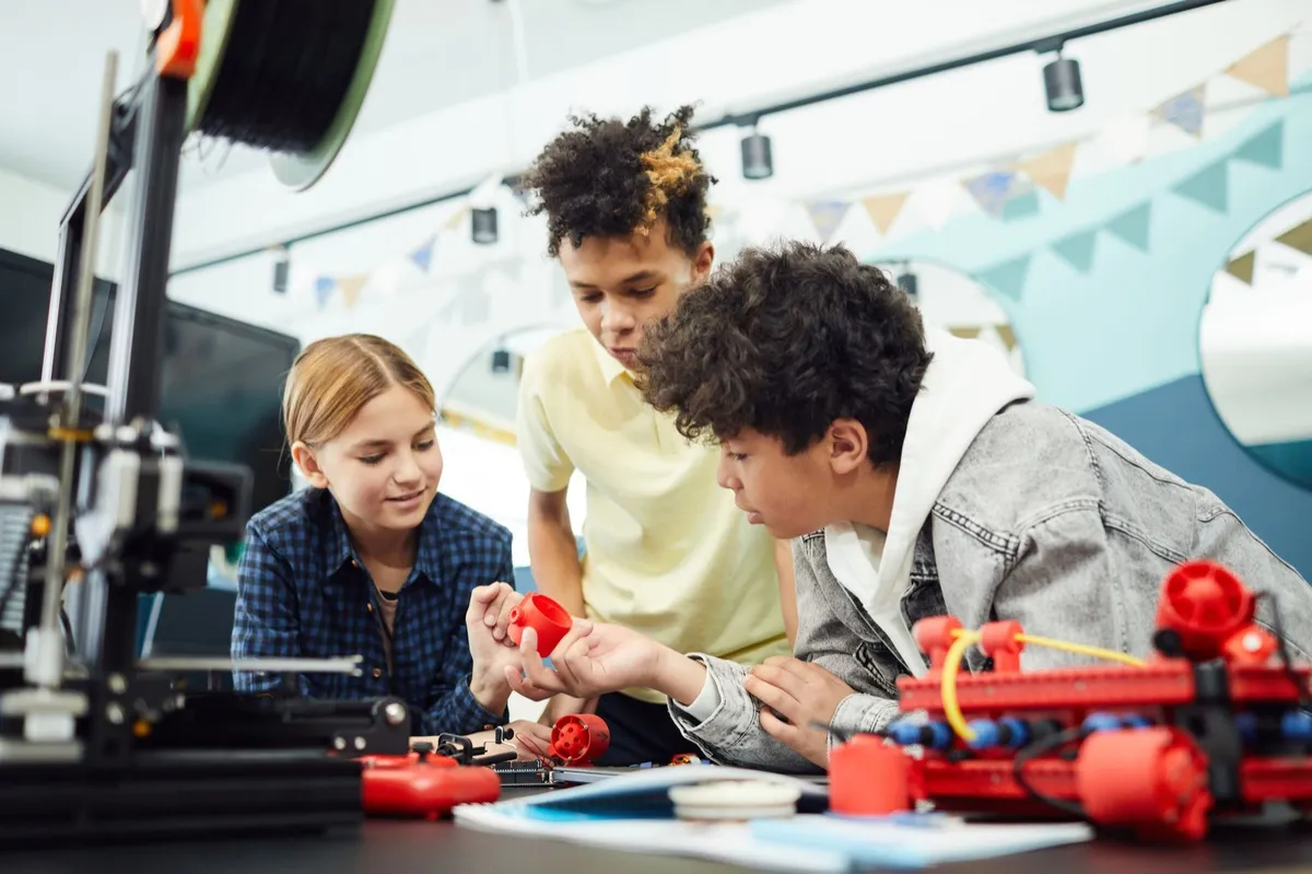 Teens building a hands-on project together
