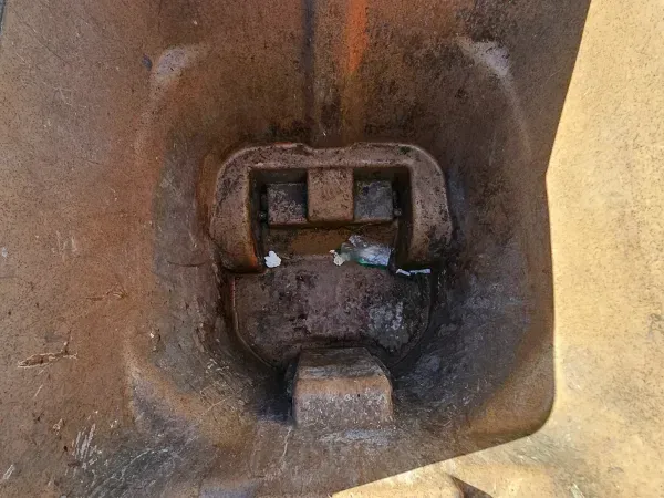 Dirty dumpster bin in Cape Coral before professional cleaning, showing heavy grime and buildup.