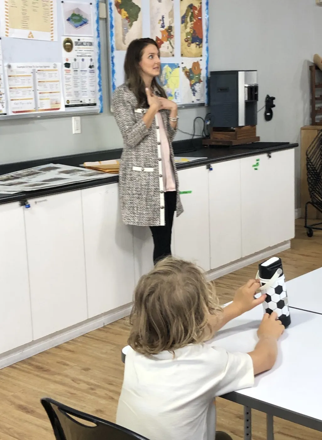 Diana, a parent volunteer, enriching Evergreen’s real-estate project-based learning unit