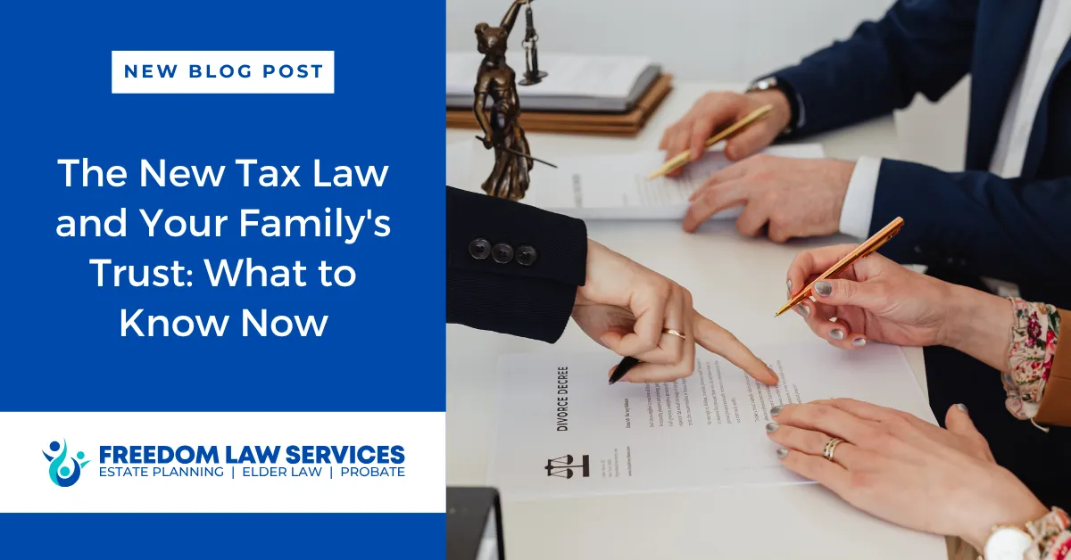 Freedom Law Services new blog post graphic titled ‘The New Tax Law and Your Family’s Trust: What to Know Now,’ with attorneys reviewing trust and divorce decree documents at a conference table.