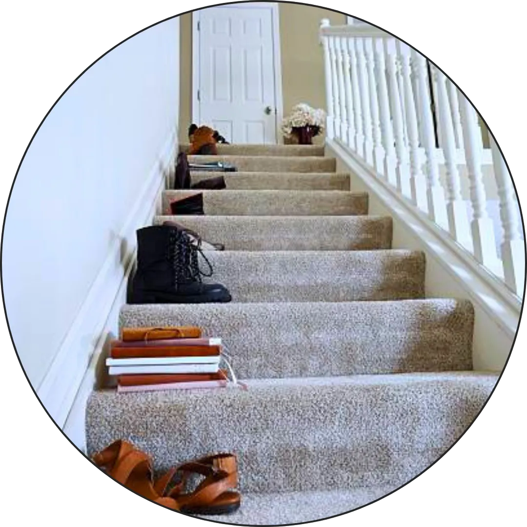 Picture of items on carpeted stairs