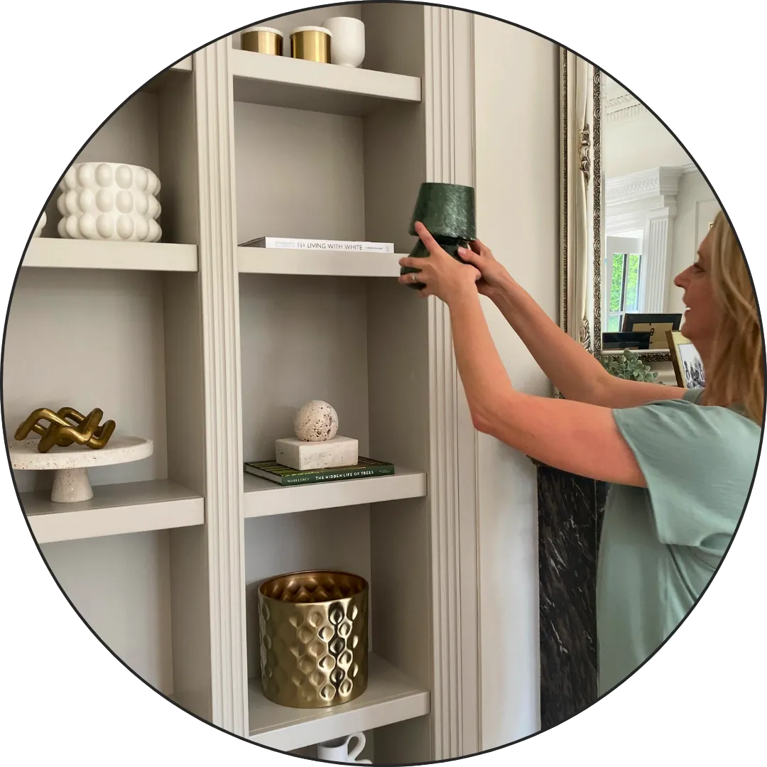 Picture of Becky from White Space arranging items on shelves