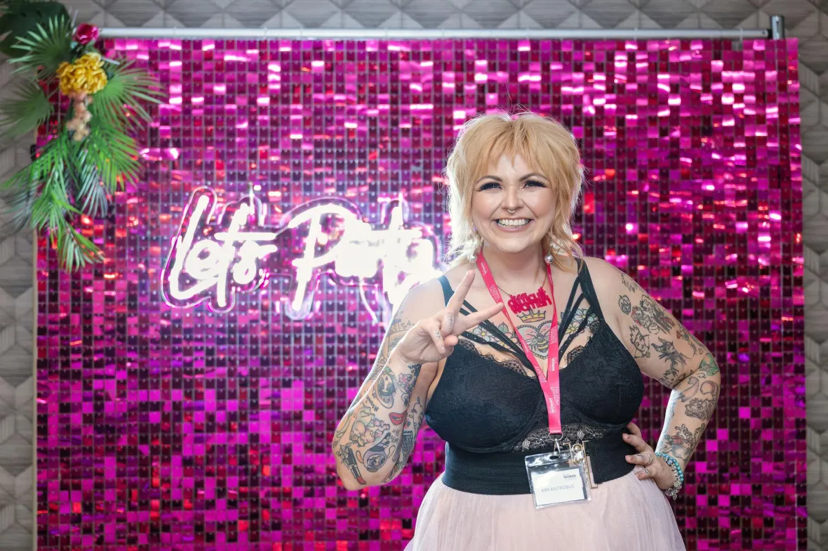 Kim by the disco backdrop