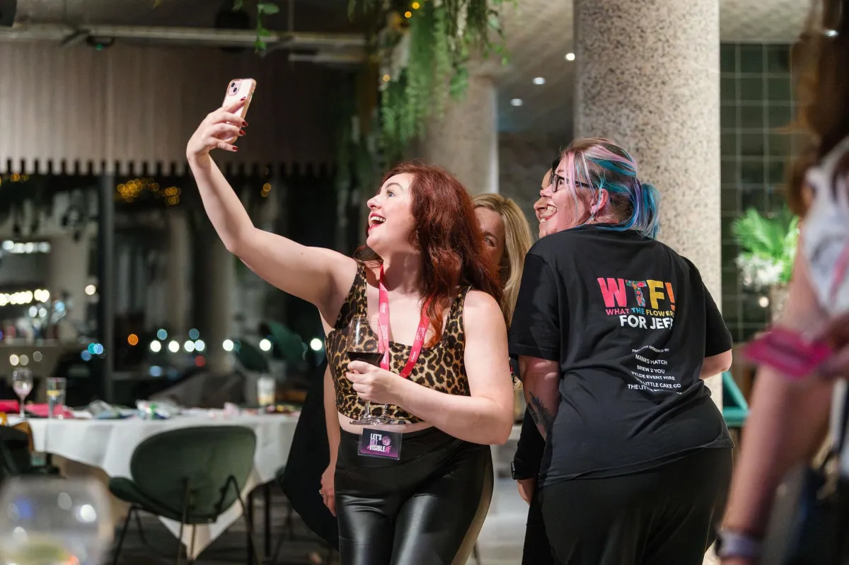 Women having fun at the launch party