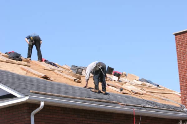 A professional crew replaces a roof in Southern Maine