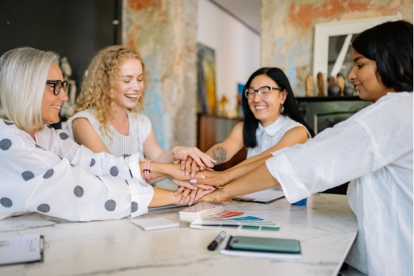 Team of women with hands together