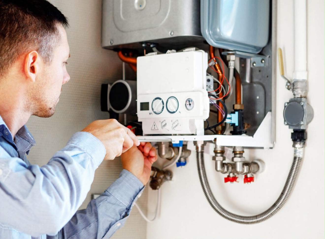 Central heating service in Godalming being carried out on a gas boiler