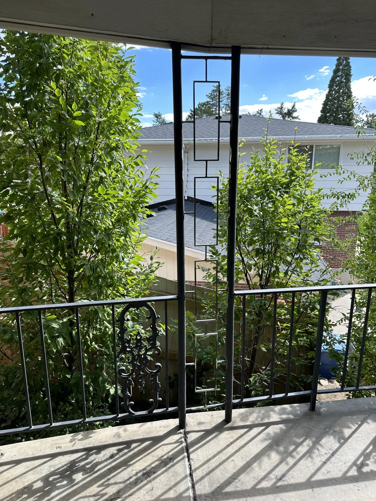 Custom metal railing on a concrete patio