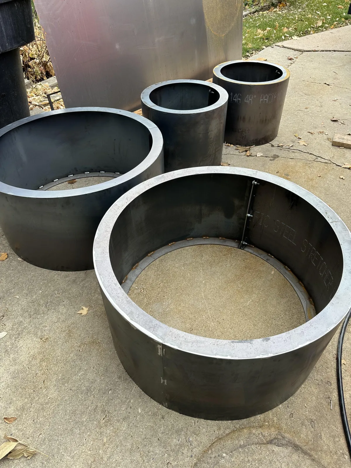 custom, round metal planters