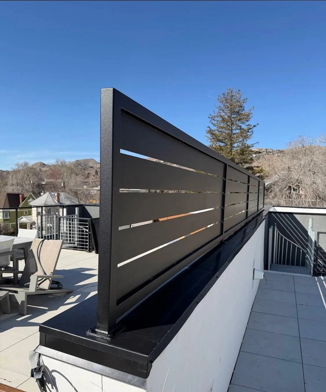 Custom metal pergola in the backyard of a home