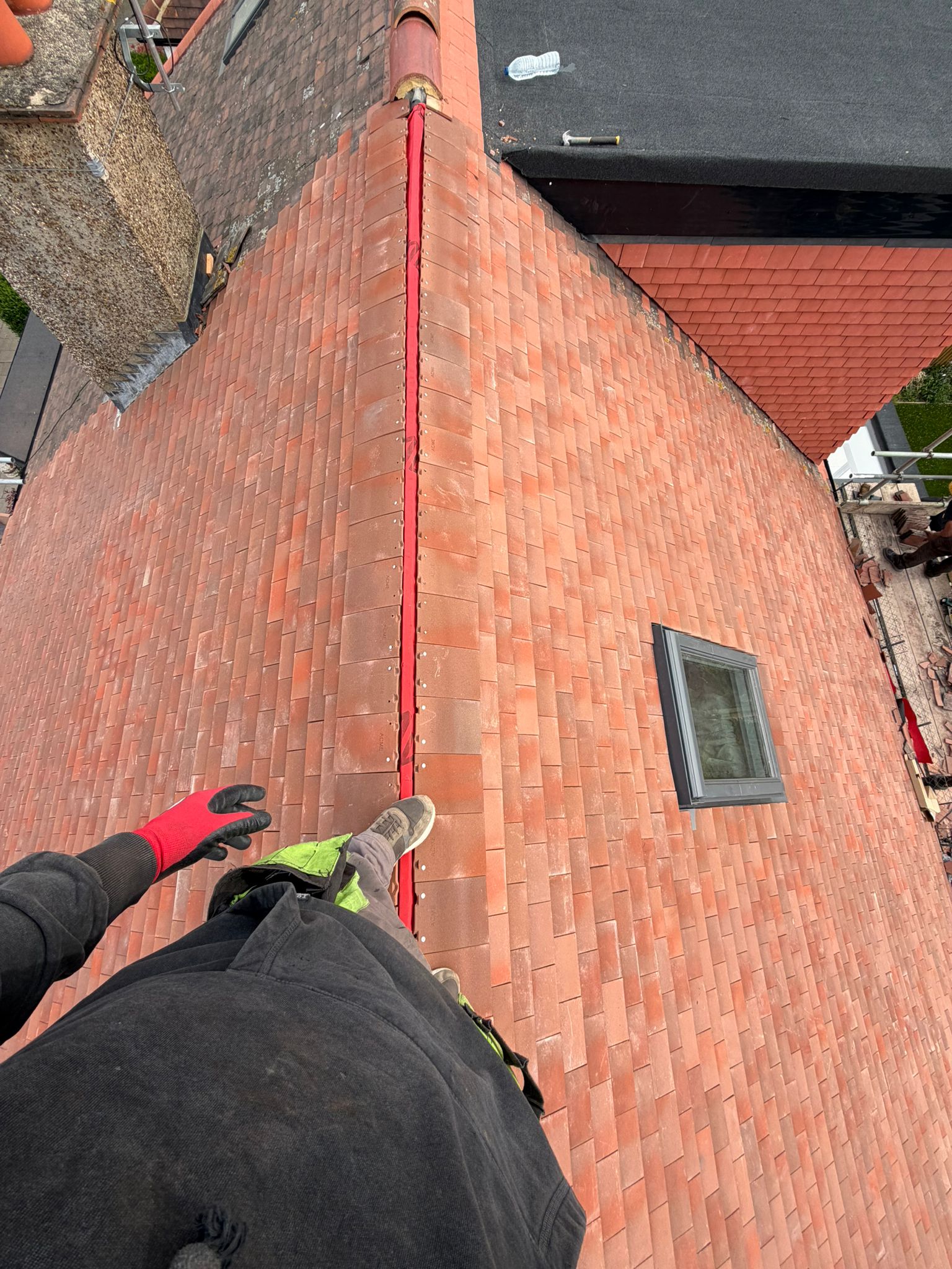 Roof tile installation on a newly constructed pitched roof
