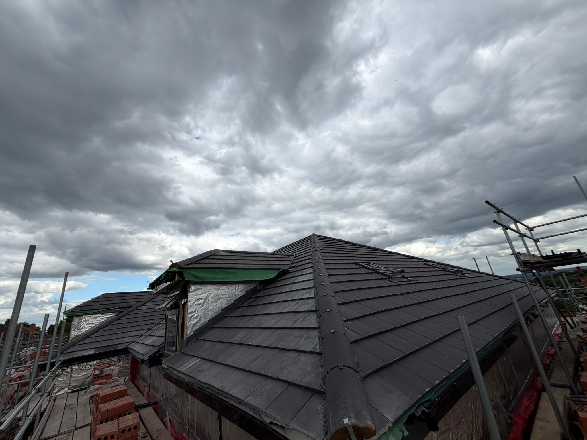 New slate roof installation on a residential home