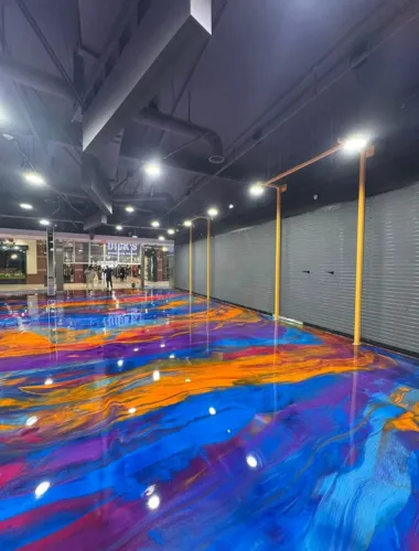 Commercial epoxy floor coating with diamond grinding surface prep