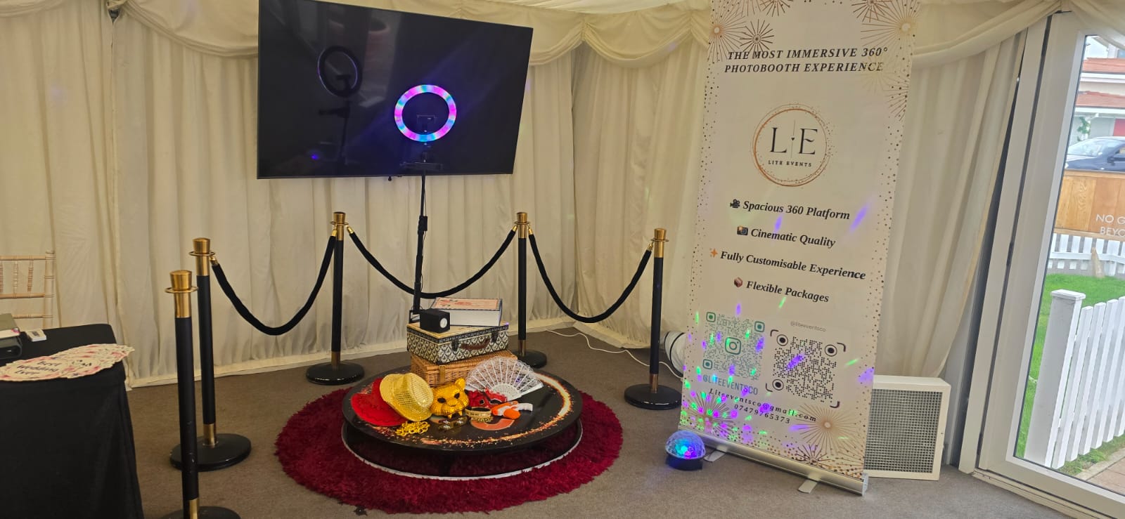 clear glass bottle beside brown woven basket with fruits on table