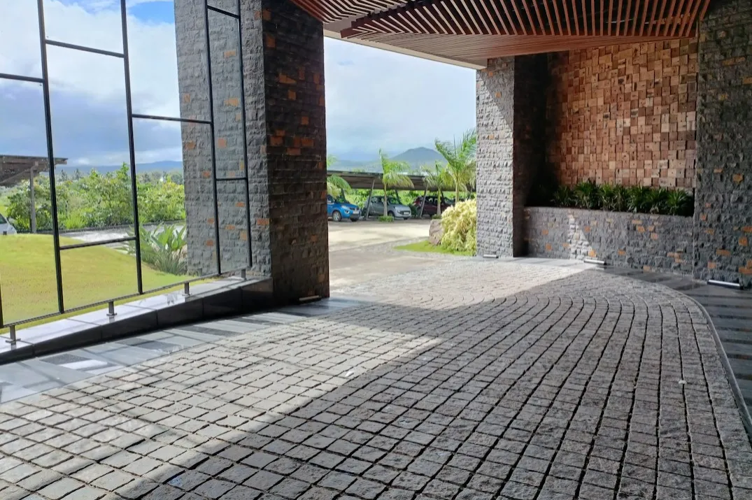 Pressure washing service in Larkfield cleaning moss from a patio