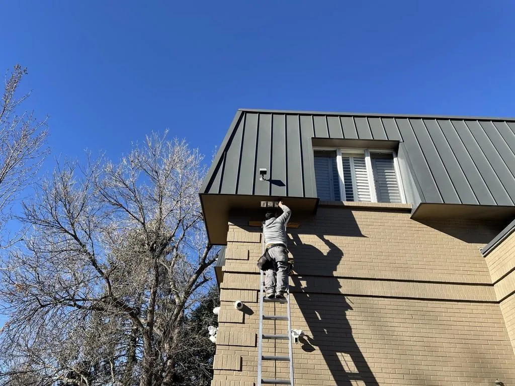 Licensed roofing crew replacing shingles on Parker Colorado home