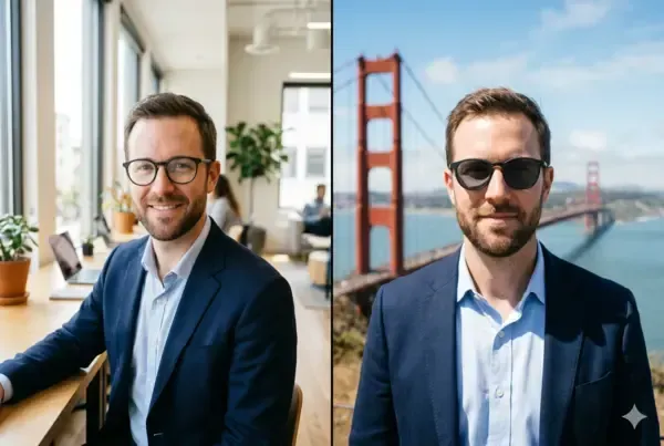 Man wearing photochromic eyeglasses that are half-clear indoors and half-darkened outdoors with San Francisco skyline background