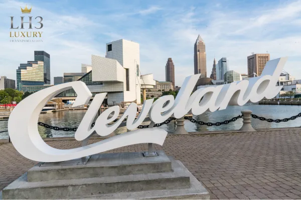 Cleveland Ohio skyline with city sign, LH3 luxury transportation and limo service