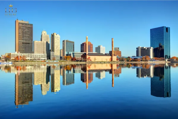 Toledo Ohio downtown skyline reflecting on water, LH3 chauffeur and limo service"