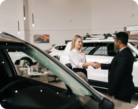 Couple consulting dealership agent, LH3 vehicle locating and acquisition concierge service"
