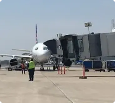 "Toledo Express Airport exterior with airplane, LH3 airport transfer service"