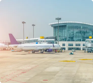 Cleveland Hopkins International Airport terminal with planes, LH3 chauffeur service"