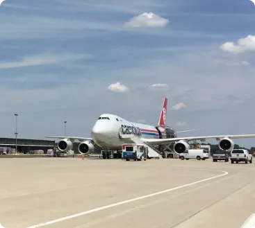Airplane on runway at Rickenbacker International Airport, LH3 airport transfer service"