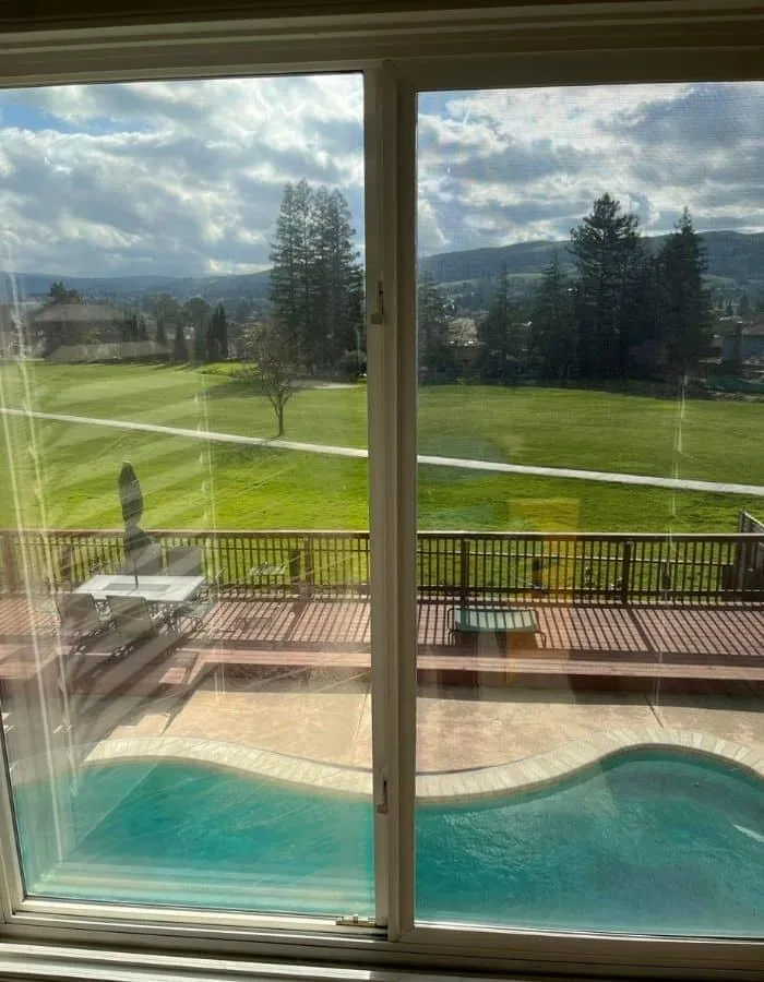 Professional residential window cleaning Vallejo CA clear glass doors pool view Teodor Window Cleaning