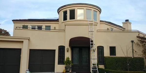 Residential window cleaning service two-story luxury home Solano County professional ladder work Teodor Window Solar Cleaning